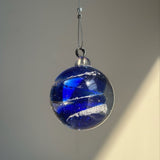 Handcrafted glass suncatcher infused with memorial ash.