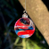 Handcrafted glass suncatcher infused with memorial ash.