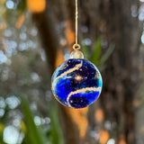Handcrafted glass suncatcher infused with memorial ash.